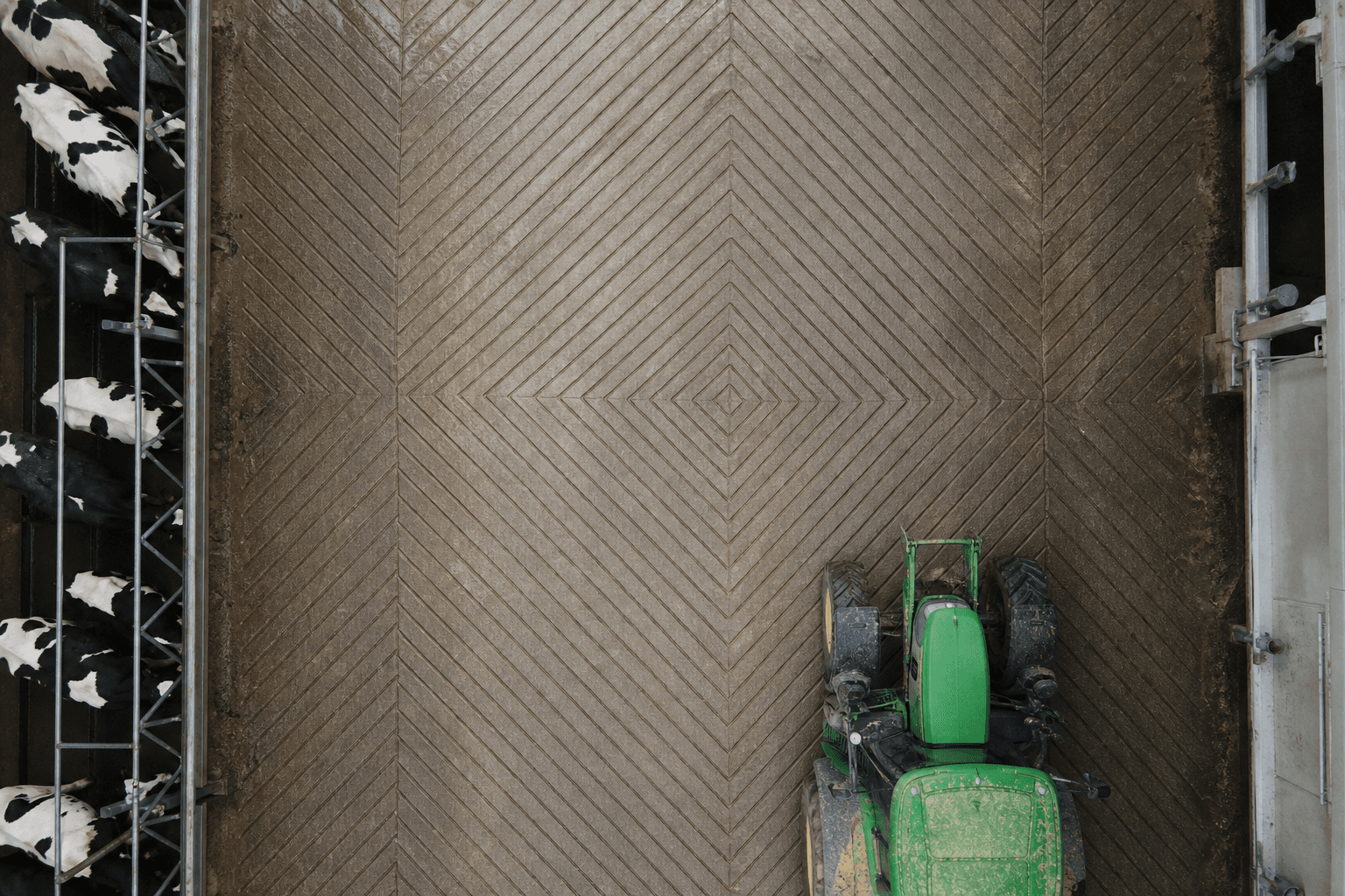 Straight line, tractor herringbone, and diamond grooving patterns on dairy barn concrete floors